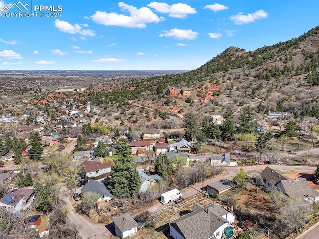 bird's eye view with a mountain view and a residential view