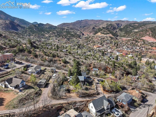 drone / aerial view featuring a mountain view