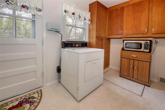 2354 Valley Forge Rd, Colorado Springs, CO 80907 - laundry area featuring visible vents, plenty of natural light, washer / clothes dryer, and laundry area