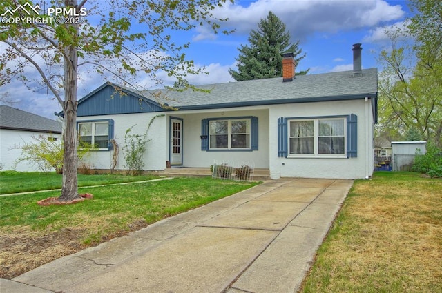 2354 Valley Forge Rd, Colorado Springs, CO 80907 - view of front of property featuring stucco siding and a front lawn