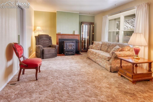 2354 Valley Forge Rd, Colorado Springs, CO 80907 - carpeted living area featuring a wood stove