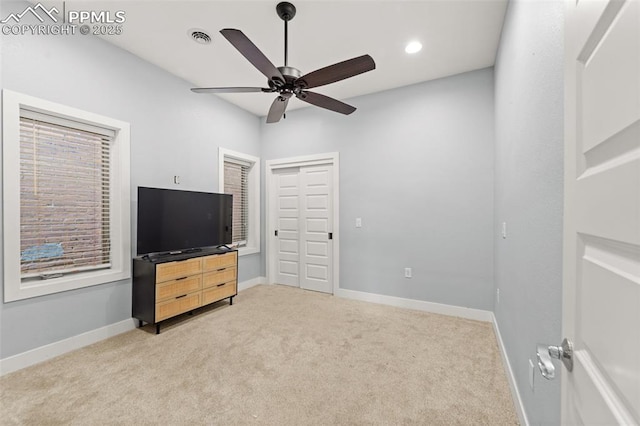 unfurnished bedroom with a ceiling fan, visible vents, recessed lighting, light carpet, and baseboards