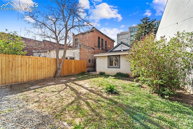view of yard with fence