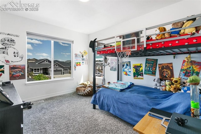 carpeted bedroom with baseboards