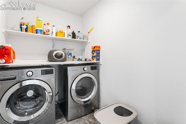 clothes washing area with independent washer and dryer