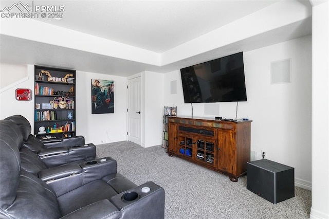 carpeted living room featuring baseboards