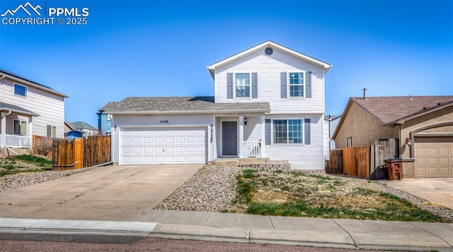1536 Ancestra Dr, Fountain, CO 80817 - traditional-style home with a garage, fence, and driveway