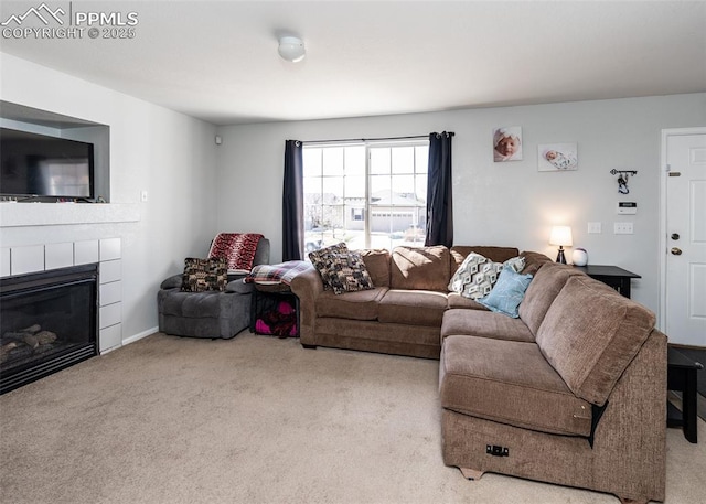 1536 Ancestra Dr, Fountain, CO 80817 - carpeted living area featuring a glass covered fireplace