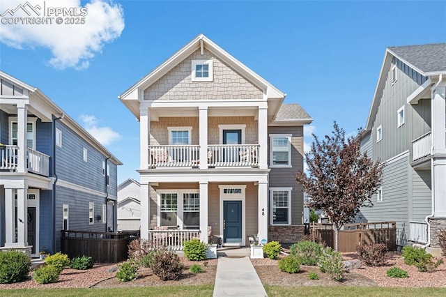 48 Mayflower Park Pl, Colorado Springs, CO 80905 - view of front facade with covered porch and a balcony