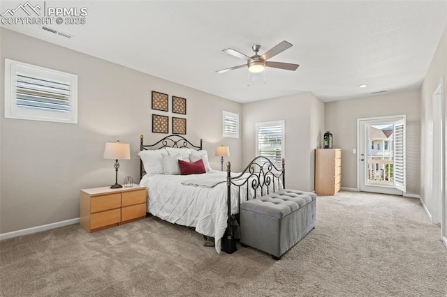 48 Mayflower Park Pl, Colorado Springs, CO 80905 - carpeted bedroom featuring access to outside, baseboards, and ceiling fan