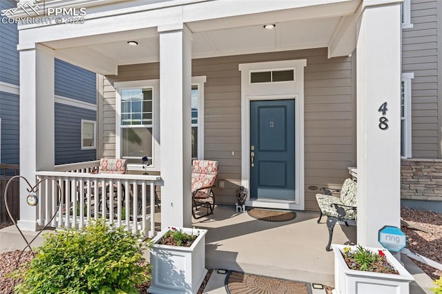 48 Mayflower Park Pl, Colorado Springs, CO 80905 - property entrance featuring a porch