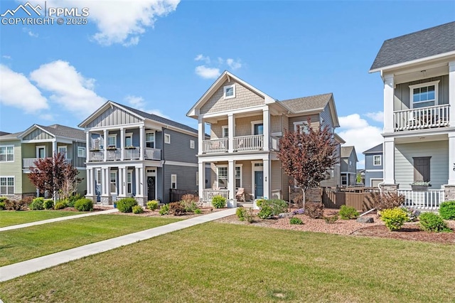 48 Mayflower Park Pl, Colorado Springs, CO 80905 - craftsman inspired home featuring covered porch, a front yard, a residential view, and a balcony