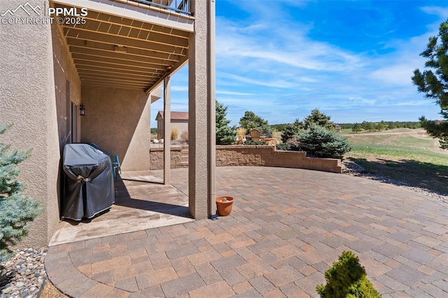 view of patio / terrace featuring a grill
