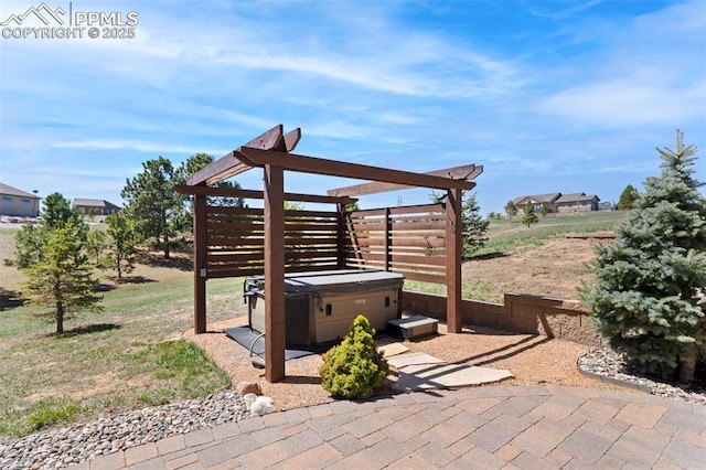 view of patio featuring a pergola and a hot tub