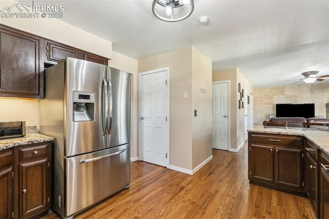 620 Jayton Dr, Colorado Springs, CO 80911 - kitchen featuring stainless steel fridge with ice dispenser, a ceiling fan, dark brown cabinets, and wood finished floors