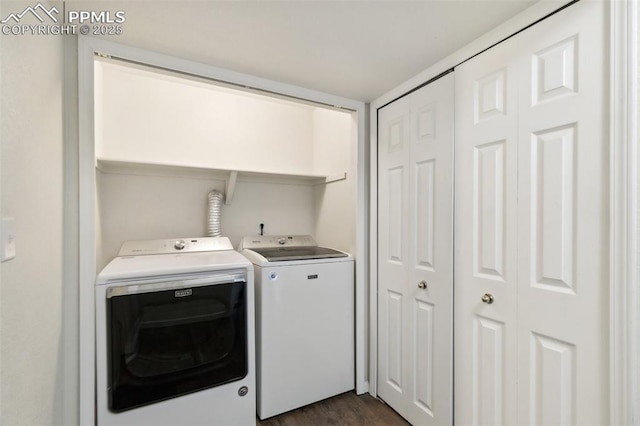 8246 Pinegate Dr, Colorado Springs, CO 80925 - laundry room with washer and dryer and dark wood-style flooring