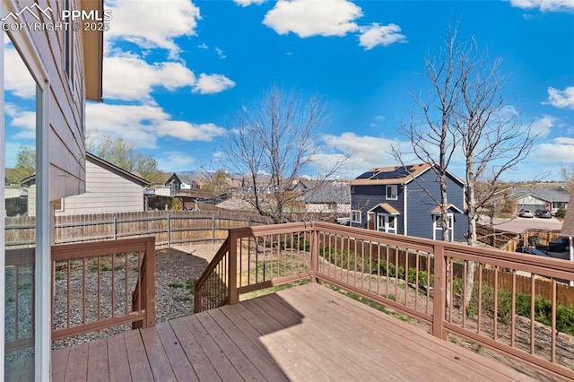 8246 Pinegate Dr, Colorado Springs, CO 80925 - wooden deck with a residential view and a fenced backyard