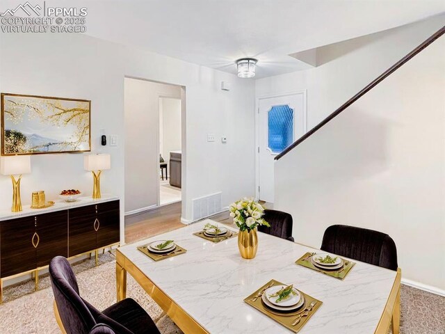 422 Cobblestone Dr, Colorado Springs, CO 80906 - dining area with baseboards and visible vents