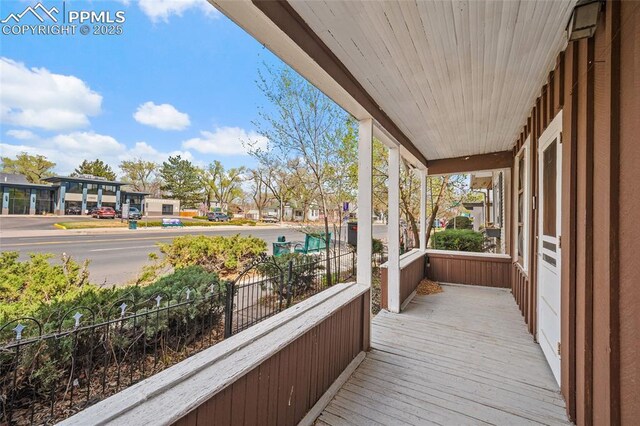 1903 W Colorado Ave, Colorado Springs, CO 80904 - wooden terrace featuring covered porch