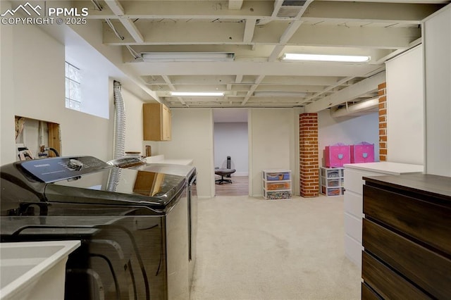 1866 S Pennsylvania St, Denver, CO 80210 - laundry room featuring washer and dryer, light carpet, and cabinet space