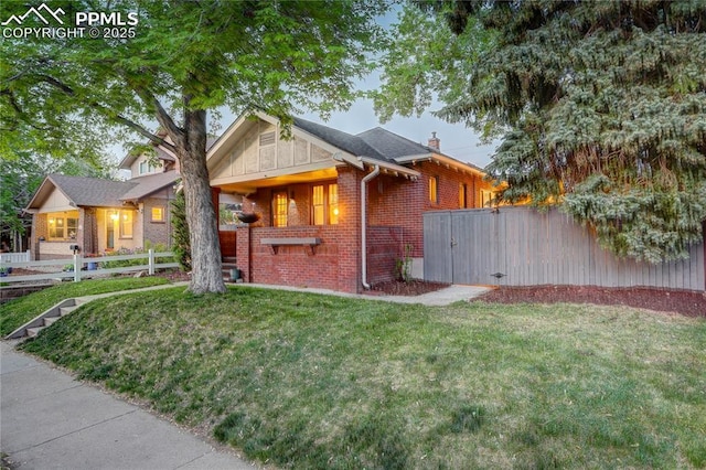 1866 S Pennsylvania St, Denver, CO 80210 - view of front of property featuring brick siding and a chimney