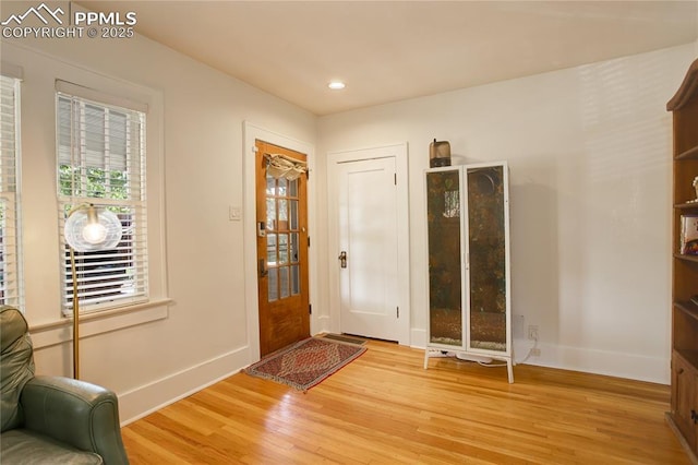 1866 S Pennsylvania St, Denver, CO 80210 - foyer with wood finished floors and recessed lighting