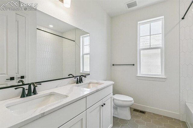 4331 Soapberry Pl, Castle Rock, CO 80108 - bathroom with a sink, visible vents, and plenty of natural light