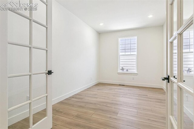 4331 Soapberry Pl, Castle Rock, CO 80108 - spare room featuring baseboards, recessed lighting, and light wood-style floors