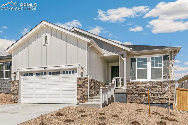 4331 Soapberry Pl, Castle Rock, CO 80108 - craftsman-style house featuring stone siding, a garage, board and batten siding, fence, and driveway