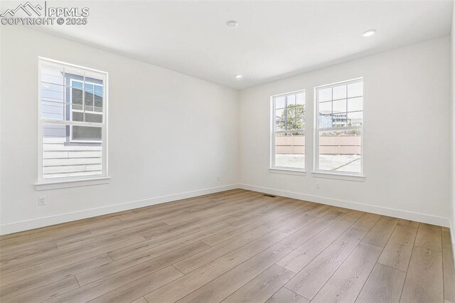 4331 Soapberry Pl, Castle Rock, CO 80108 - spare room with recessed lighting, light wood-style flooring, baseboards, and visible vents
