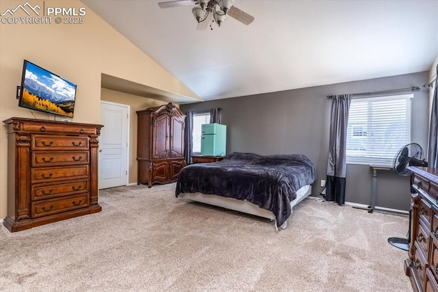 bedroom with baseboards, vaulted ceiling, carpet flooring, and ceiling fan