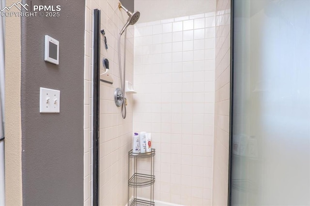 full bathroom featuring a stall shower