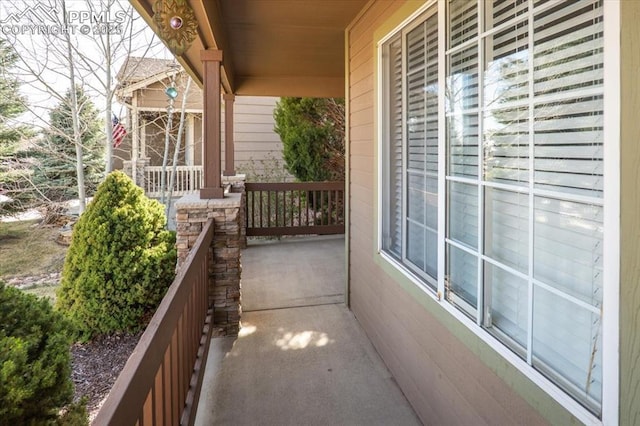 balcony featuring covered porch