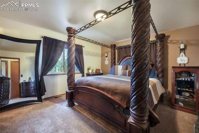carpeted bedroom featuring baseboards
