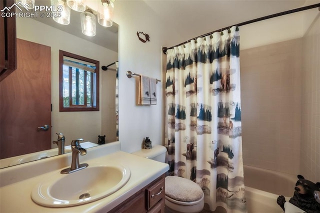 bathroom with toilet, vanity, and shower / tub combo with curtain