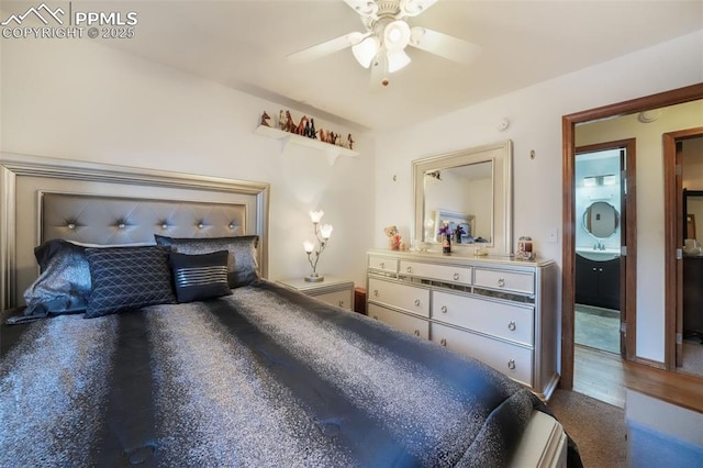 bedroom with a ceiling fan and ensuite bathroom