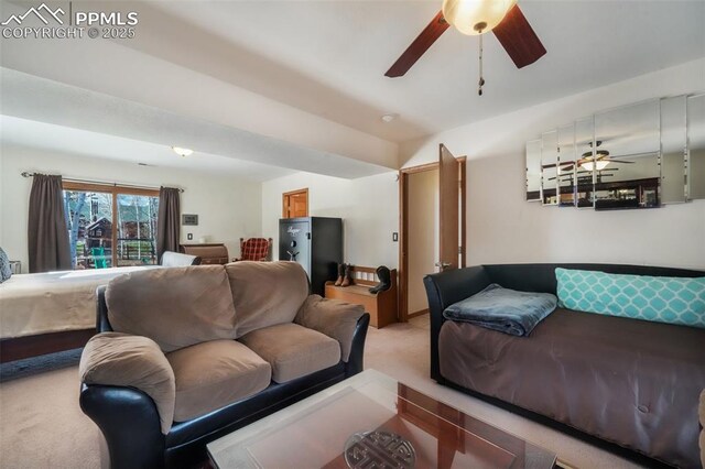 living room featuring ceiling fan and light carpet
