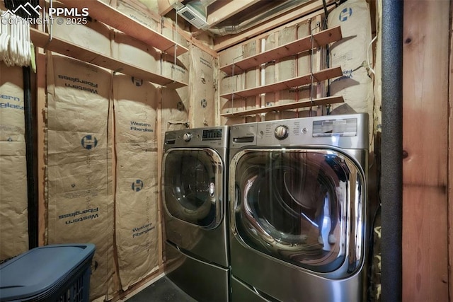 washroom featuring independent washer and dryer