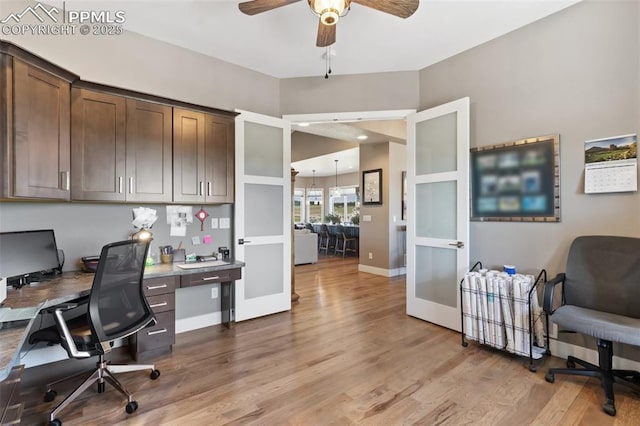 20356 Royal Troon Dr, Monument, CO 80132 - home office featuring a ceiling fan, wood finished floors, baseboards, and french doors