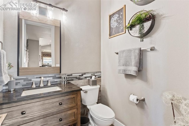 20356 Royal Troon Dr, Monument, CO 80132 - half bath with toilet, vanity, and backsplash