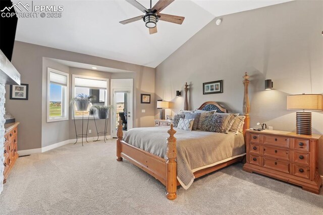 20356 Royal Troon Dr, Monument, CO 80132 - bedroom featuring light carpet, baseboards, a ceiling fan, and high vaulted ceiling