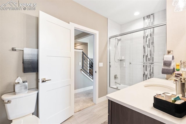 20356 Royal Troon Dr, Monument, CO 80132 - bathroom with toilet, vanity, recessed lighting, and baseboards