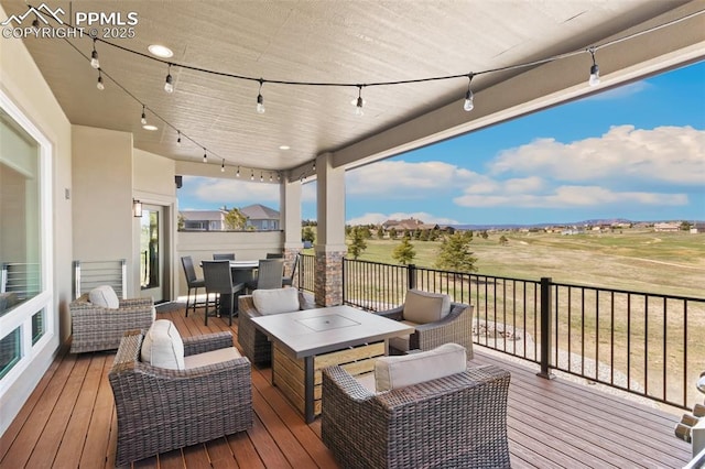 20356 Royal Troon Dr, Monument, CO 80132 - wooden deck featuring outdoor dining area