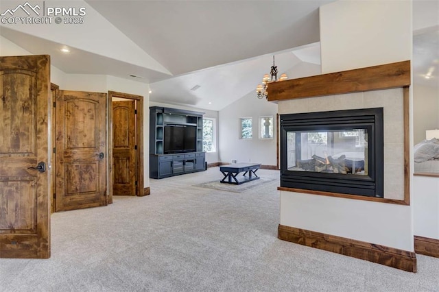 living room featuring a multi sided fireplace, baseboards, vaulted ceiling, and carpet floors