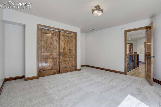 bedroom with visible vents, baseboards, and carpet floors