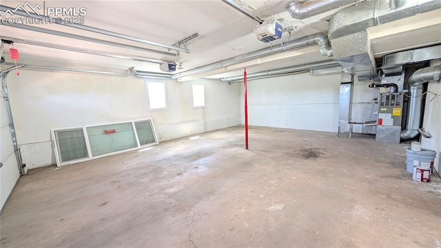 720 W Northwoods Dr, Woodland Park, CO 80863 - garage featuring a garage door opener