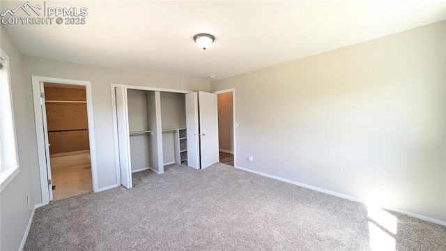 720 W Northwoods Dr, Woodland Park, CO 80863 - unfurnished bedroom featuring a closet, carpet flooring, and baseboards