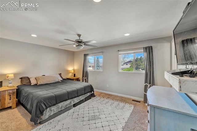 6465 Pawnee Cir, Colorado Springs, CO 80915 - bedroom featuring ceiling fan, light colored carpet, recessed lighting, baseboards, and visible vents