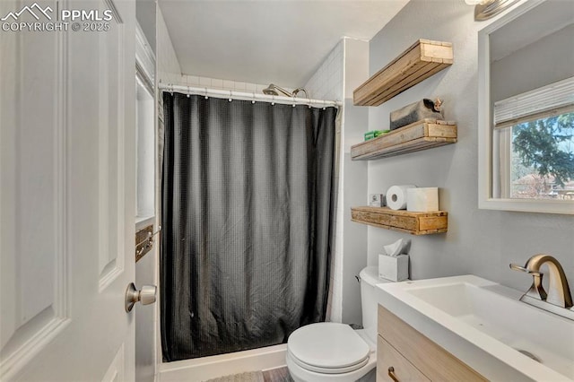 6465 Pawnee Cir, Colorado Springs, CO 80915 - bathroom with vanity, toilet, and a shower stall