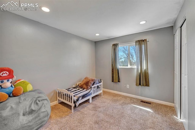 6465 Pawnee Cir, Colorado Springs, CO 80915 - carpeted bedroom with recessed lighting, baseboards, visible vents, and a closet